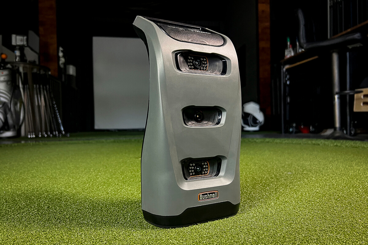 Bushnell Launch Pro camera launch monitor on simulator turf